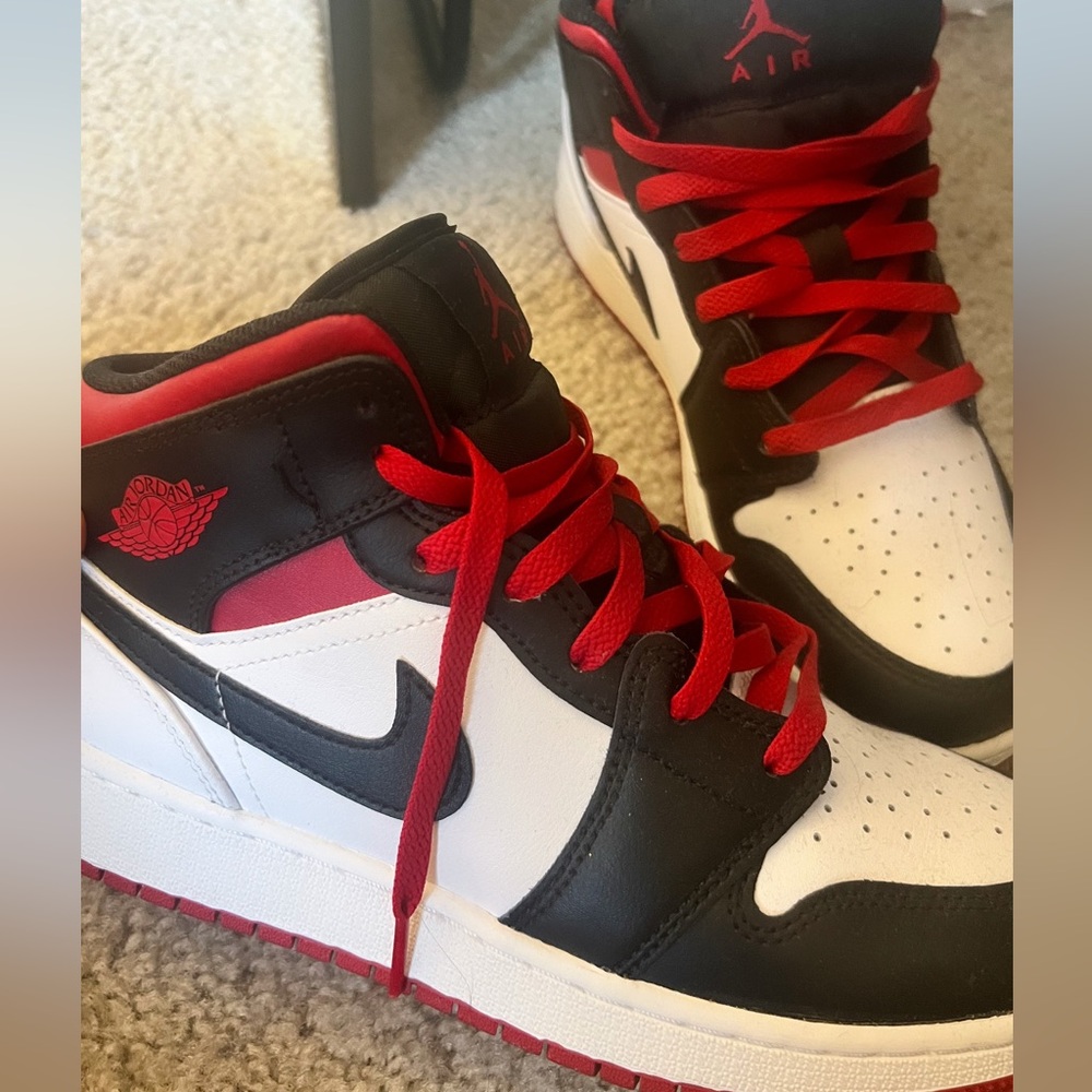 Women’s/teens Black and Red Jordan 1’s
